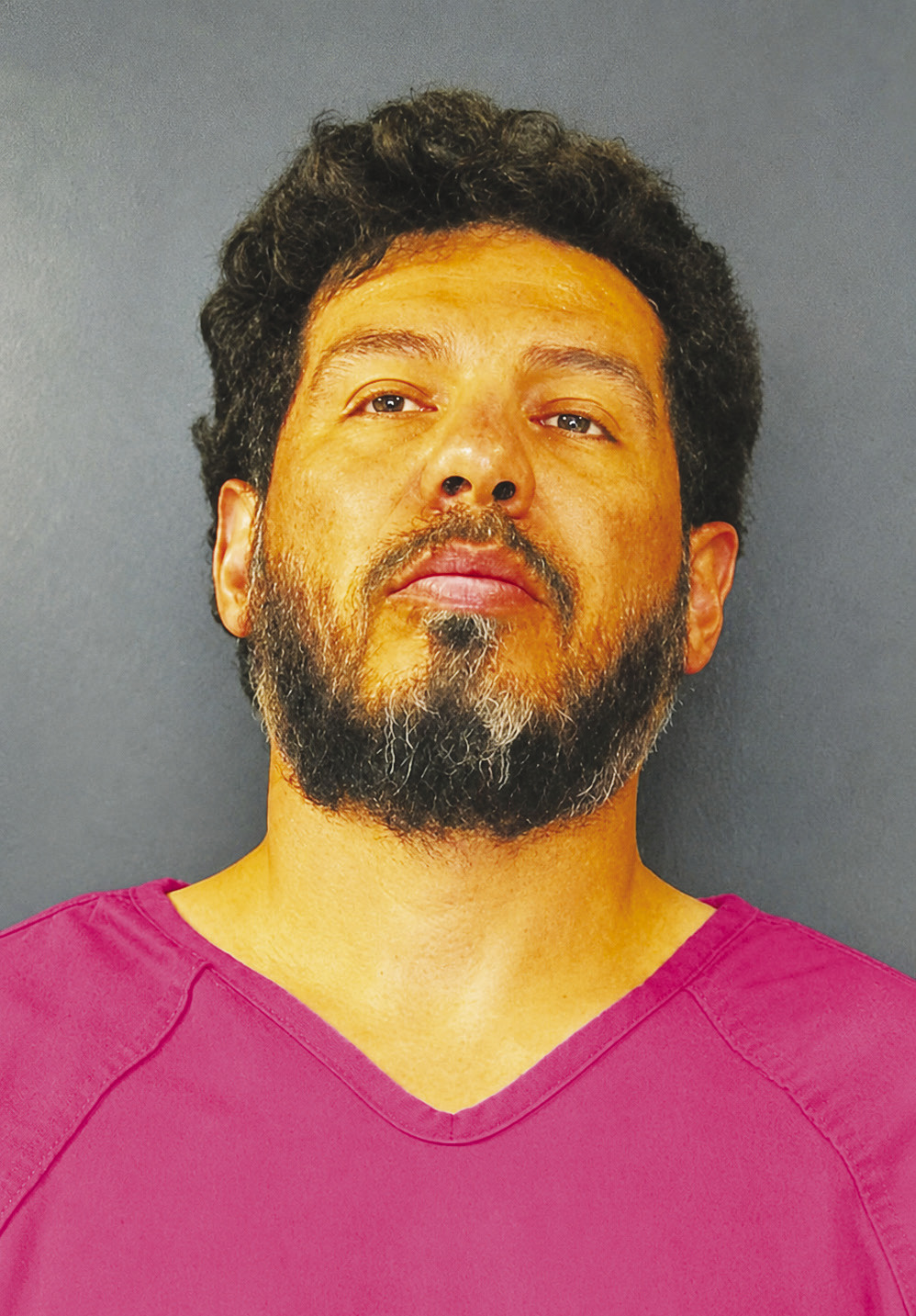 Oscar Perez, 35, is charged with aggravated kidnapping causing bodily injury and aggravated assault with a deadly weapon in connection with the June 6 assault and kidnapping of his girlfriend in Martin County. Booking photo courtesy of the Martin County Sheriff’s Office. (This photo has been digitally enhanced)
