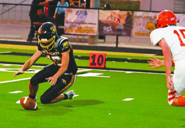 Lane Cearley recovers a fumble during non-district action earlier this season.