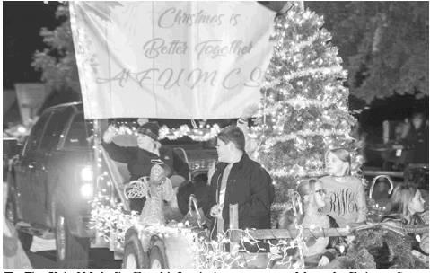 The First United Methodist Church’s float invites everyone to celebrate the Christmas Season together. Christmas Cantata set for Dec. 15.