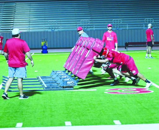 The Stanton Buffaloes practice blocking drills during two-a-days in preparation for the 2026 season.