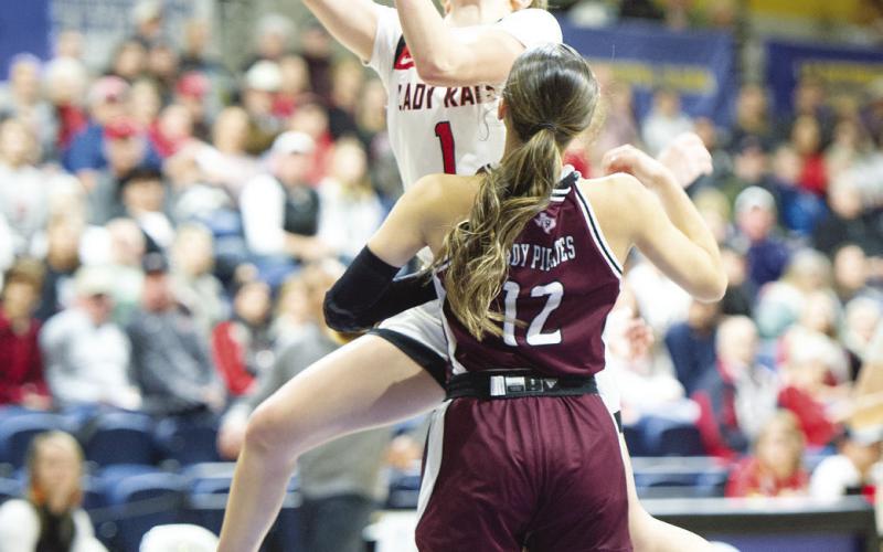 Karly Baker makes the layup and gets fouled in the Regional Semi-Final against Eula Tuesday night in San Angelo.