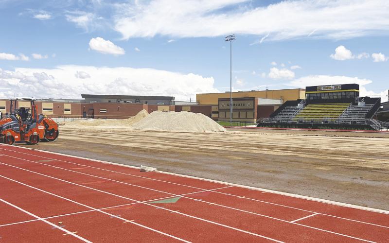 Work is progressing on new turf football field at Grady High School.