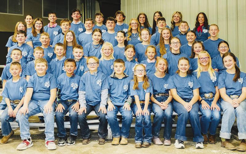 Participants in the 89th annual Glasscock County Junior Livestock Show pose for a group photo.