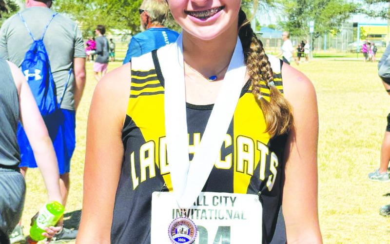 Madison leads Lady Cats at Tall City meet