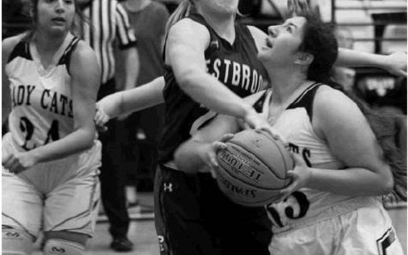 Grady’s Mercedes Jimenez gets fouled and makes the layup for a crucial three points during the Wildcats win over Westbrook Tuesday night in Grady.
