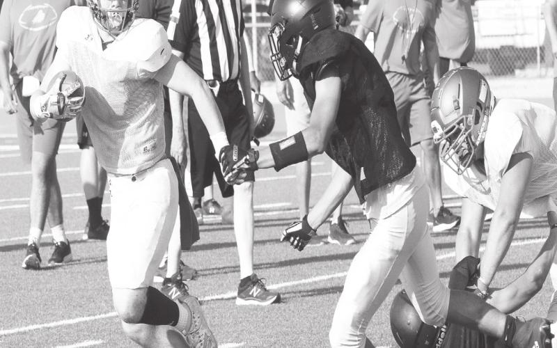 A huge pancake block helped Evan Cox avoid being tackled in the backfield.