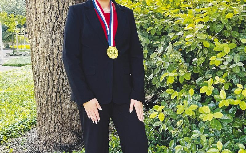 LEFT: Ella Brinkley is the Class 1A State Prose Champion.