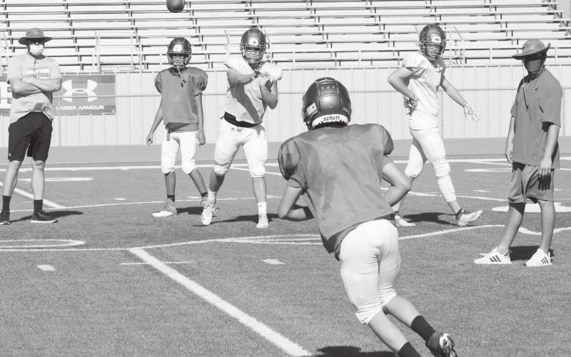 Stanton varsity quarterback Tyler Benedict works on some short passes in preparation for today’s scrimmage against Lamesa at 5 pm at Buffalo Stadium in Stanton. Capacity will be limited to 50%.
