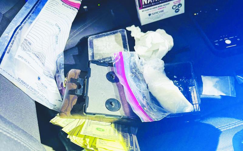 Evidence recovered from the vehicle during the drug investigation, including methamphetamine, scales and cash. Deputies found additional meth and paraphernalia in a motel room.