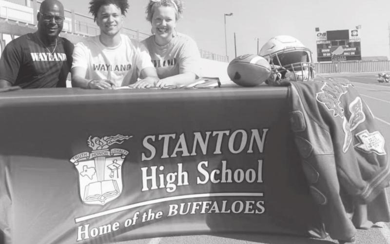 Devan Simpson will compete for Wayland Baptist University this fall in football and in the spring for track. Pictured are Simpson’s parents Jermaine and Lorie Simpson.