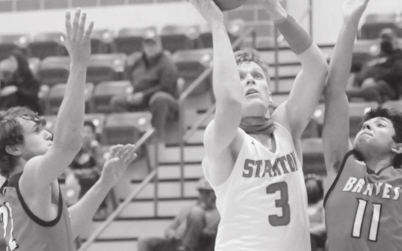 Stanton’s Josh Hensley (3) scores two highly contest points in the Buffaloes blow out win over Iraan on Dec. 18. The Buffs will be back on action on Dec. 29 against Grape Creek.