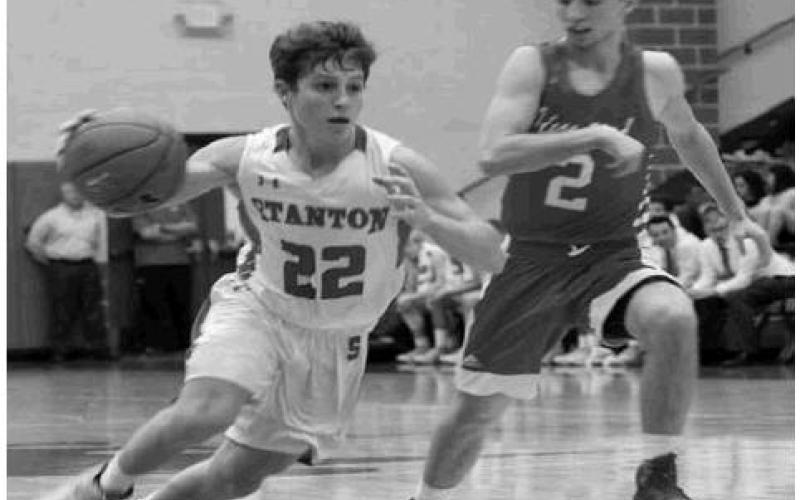 Cody Beasley drive the paint against Jim Ned Tuesday night in Stanton.
