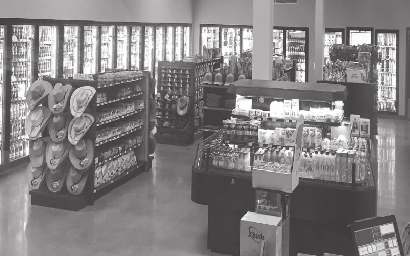 The shelves and coolers at Tarzan and Jane Gas and Grill are stocked and ready to be picked over. Swing by for a tank of gas and a bag of chips.