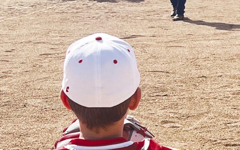 Martin County Sheriff-Elect Randy Cozart had the honor of throwing out the first pitch during Opening Ceremonies for the Martin County Little League. Braxton Noland was chosen to catch the first pitch.
