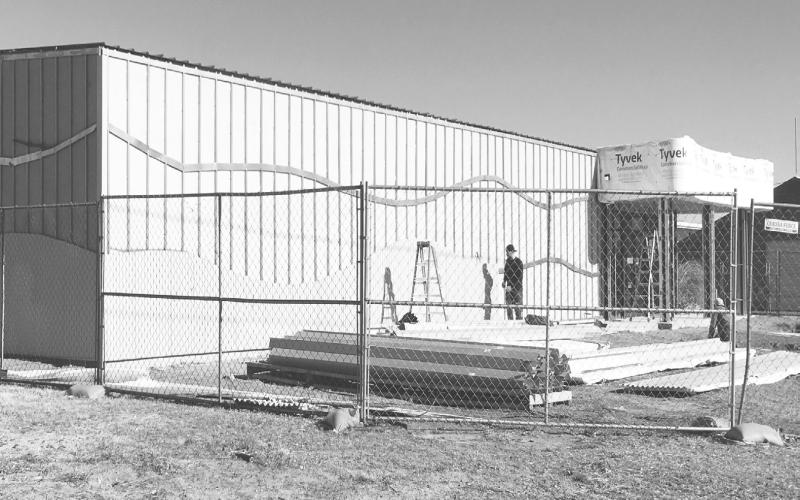 Despite the windy conditions this week, construction continues at the Martin County Historical Museum as the architectural design is followed by construction crews to give the outside of the building its new, modern contemporary look.