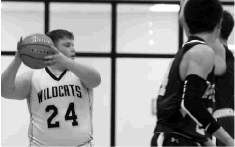 Cobe Cortez swings the ball during hardwood action against Westbrook.