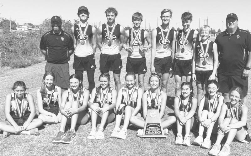 Grady’s varsity cross country teams won plenty of hardware at the district contest. The varsity girls finished fourth on Monday at the Region I meet in Lubbock and the boys were seventh.