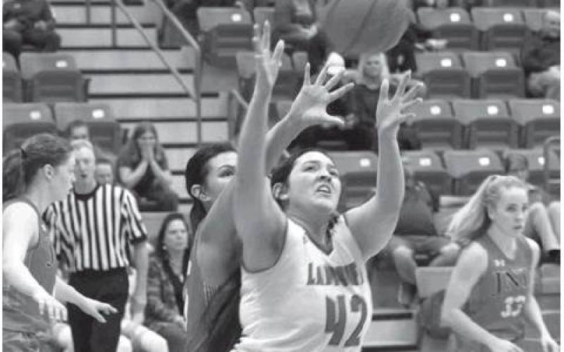 Hailea Vera Cruz posts up in district action Tuesday night against Jim Ned.