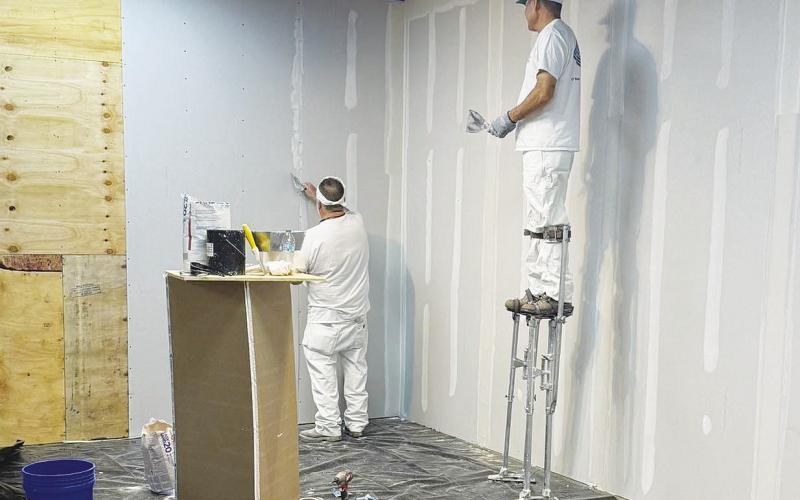 Contractors work inside the Martin County Historical Museum as renovation efforts continue. The first phase of the museum’s updated exhibits is expected to be unveiled during the weekend of the Old Settlers Reunion.