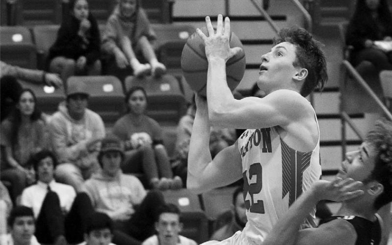 Stanton point guard Cody Beasley gets fouled while shooting a lay up Tuesday night in Stanton.