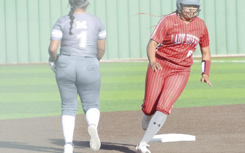 First team all-district selection Alessandra Glover rounds second base during the 2024 Bi-District Championship against Muleshoe.