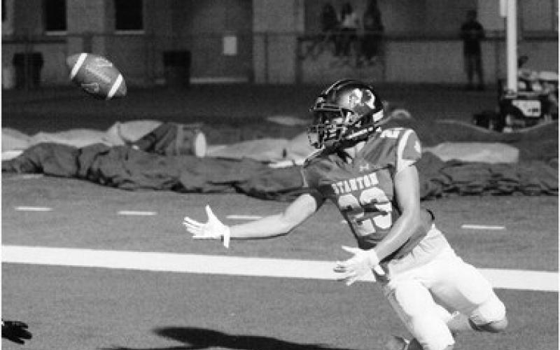 Stanton receiver Jahir Galindo makes a great sliding catch against the Merkel Badgers last week at Buffalo Stadium in Stanton.
