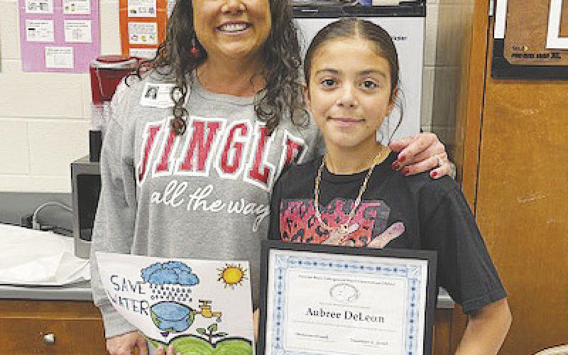 Stanton winner Aubree DeLeon (5th Grade) pictured with Brianna Allred (PBUWCD Education Coordinator)