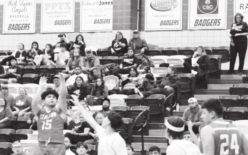 Miguel Moreno launches a three pointer late in the game against San Angelo TLCA Tuesday night at Merkel High School.