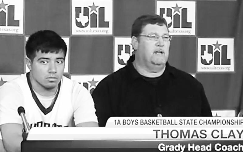 Thomas Clay speaks at a press conference at the Class A State Basketball Tournament alongside one of his favorite players of all time E.J. Rodriguez.