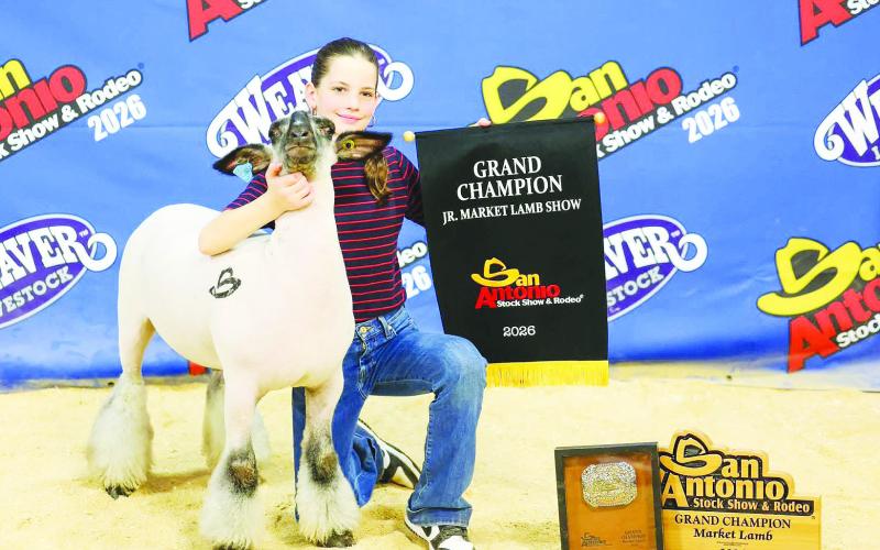 Hazyen Halfman proudly displays her Grand Champion Lamb at the San Antonio Stock Show &amp;amp; Rodeo, earning top honors against strong competition and showcasing years of hard work and dedication in the show ring.