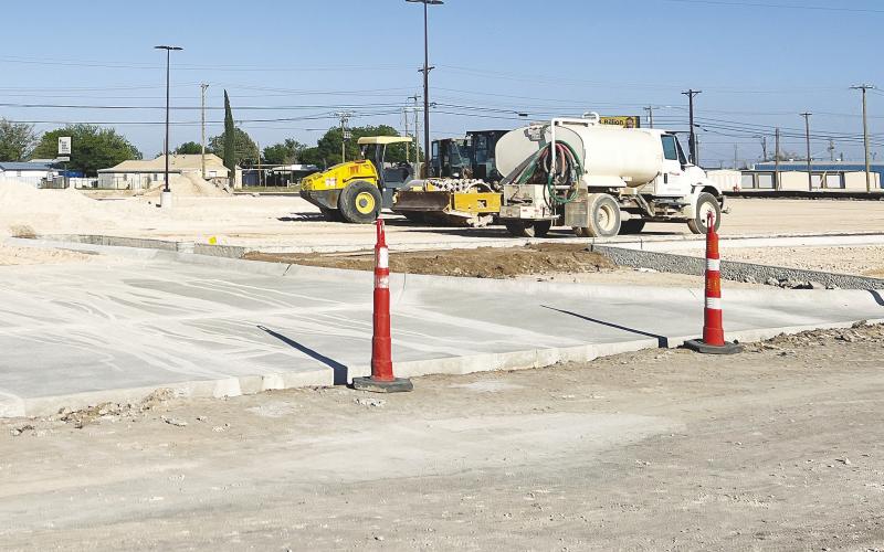 There has been a flurry of activity at Stanton High School as crews work to get the new parking lot completed before graduation.