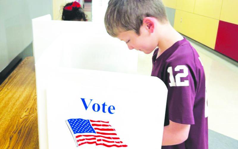 Garden City first graders recently practiced their civic duty by voting for their favorite American symbol