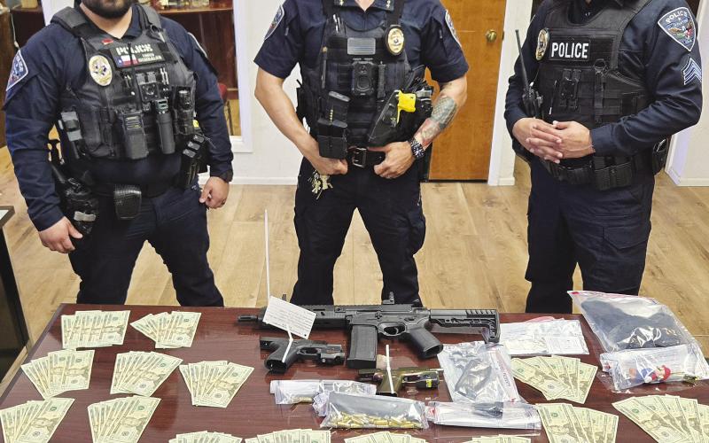 Loaded guns, THC and $1,700 in cash were seized during a traffic stop Thursday in Stanton, according to police. Authorities said the items were recovered from a vehicle after officers responded to a report of alleged threats involving firearms.