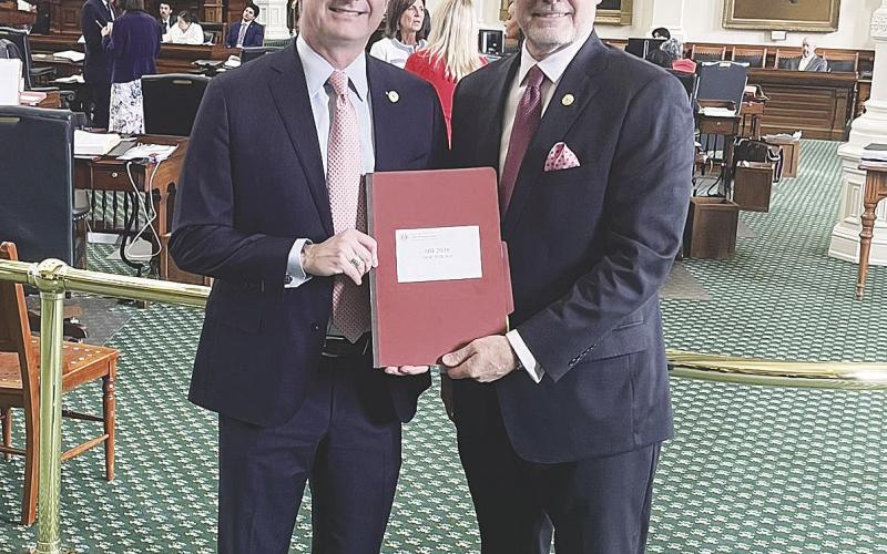 Caption: State Sen. Kevin Sparks, R-District 31 (left), and state Rep. Tom Oliverson, R-Cypress, stand in the Texas Senate chamber this week following the passage of the DOCTOR Act.