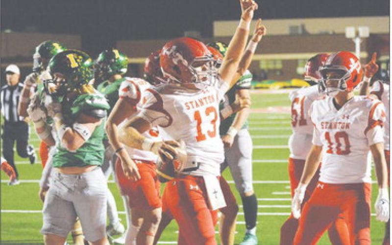 Stanton senior quarterback Jake Benedict (13) scores his final touchdown as a Buffalo during the Area round of the Class 3A DII playoffs Friday night in Denver City. The Buffaloes fell to Idalou 52-14 and finished with a 7-5 record, the best since 2010 and the first winning season since 2013.