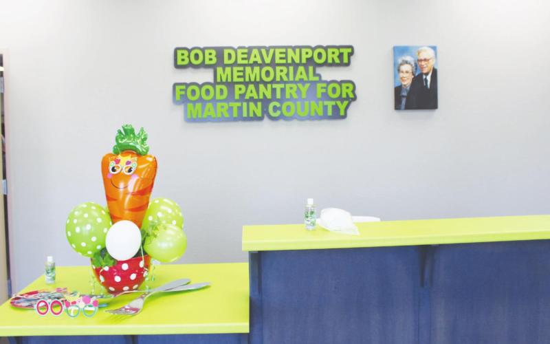 BOTTOM LEFT: A picture of Bob and Dorthy Deavanport hang on the wall of the new food pantry in Stanton.