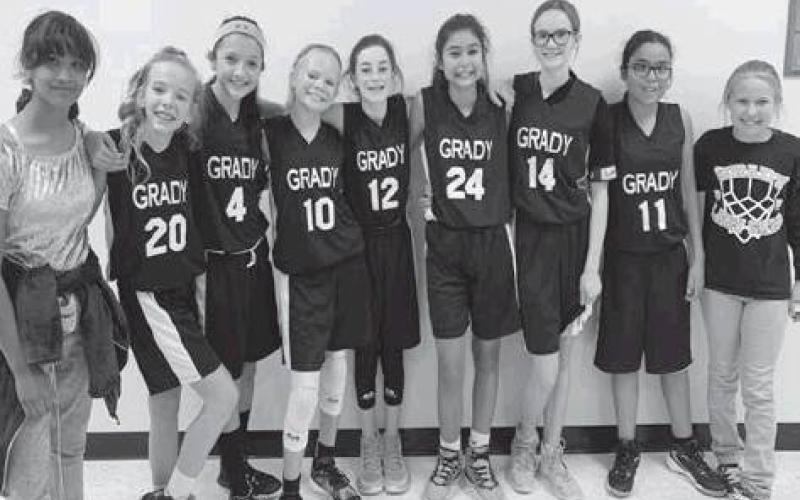Grady’s seventh grade girls won the consolation title at the Grady Junior High Tournament last weekend. Pictured are: Alaih Deanda(manager) Kailynn Peugh,Emma Parker, Kaelyn Titsworth, Rylan O’Donnell, Selig Burger, Nayce McMorries, Arianna Rodriguez, Raegan Dennis(manager)