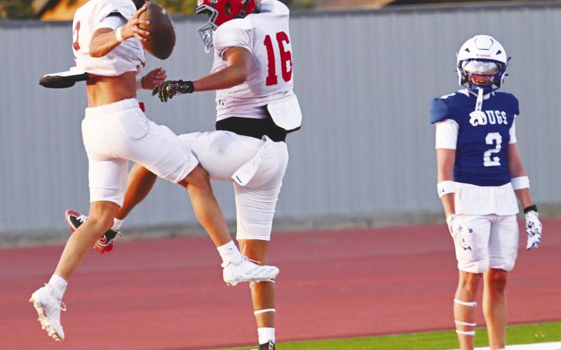 The Stanton Buffaloes celebrate a touchdown during last week’s scrimmage against Odessa Compass. The Buffs open the season of Friday in Monahans.