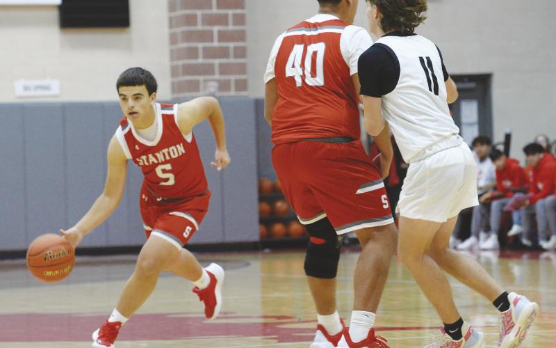 Oscar Salcido (40) sets a screen for point guard Isaiah DeLeon (5) during Hooptown action earlier this month.