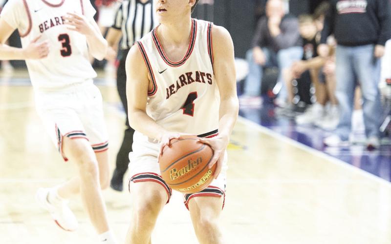 Brik Fryar lines up a 3-pointer and gives Garden City the lead during Tuesday’s Bi-District game against Paint Rock.