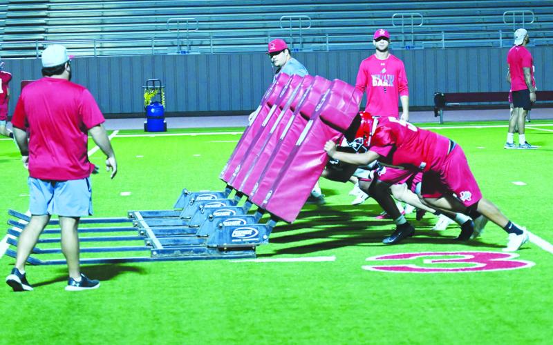 The Stanton Buffaloes practice blocking drills during two-a-days in preparation for the 2026 season.