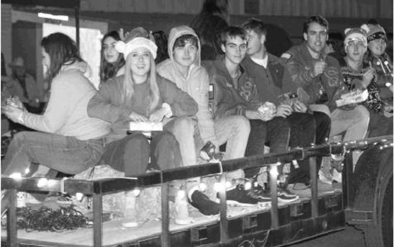 Stanton seniors toss candy canes to the crowd during the Lighted Christmas Parade.