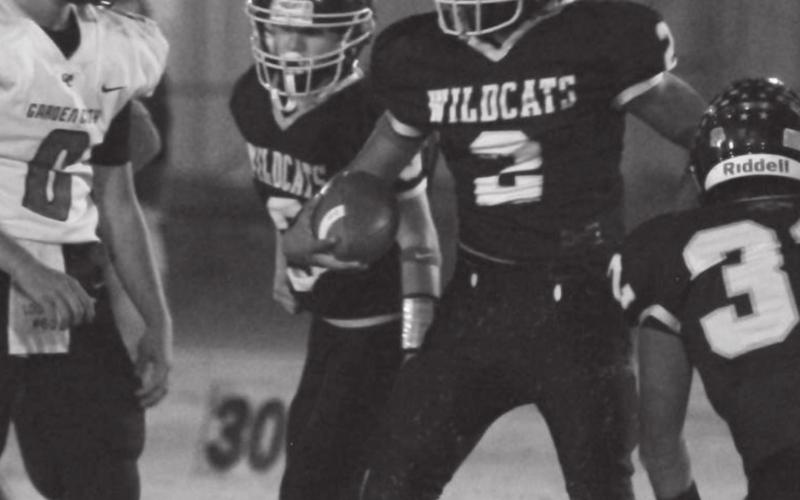 Frankie Jimenez (2) recovers a fumble during district action last week at Grady.