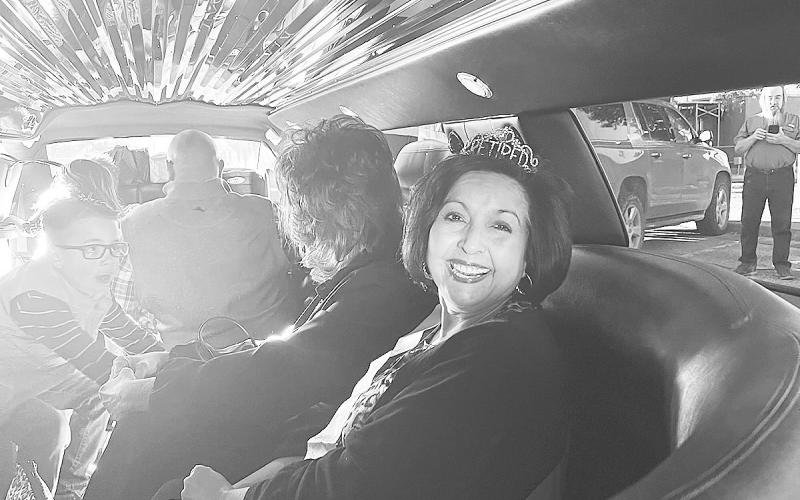 Diana Hernandez knows how to retire in style as her and her family cruise out of the Wes-Tex parking lot in a limousine after more than 24 years of service to the Stanton business.