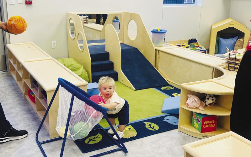 Little Beau Belew checks out the new toys during the grand opening of Glasscock County ISD’s daycare. Pic courtesy Mallory Marr