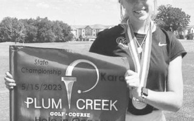 Kara Roberts aced the 13 hole at Plum Creek Golf Course during the first round of the Class A State Championships.