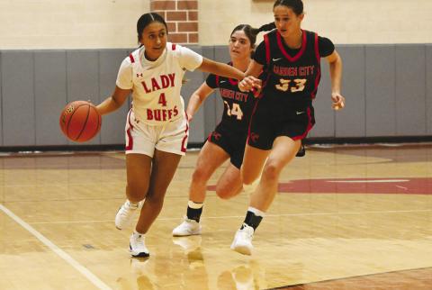 Lady Buffaloes hold off Ozona, secure home win