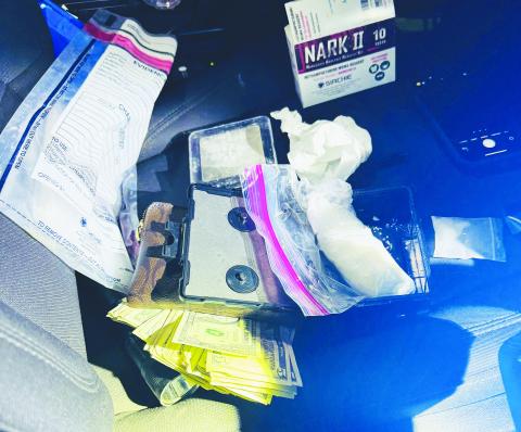 Evidence recovered from the vehicle during the drug investigation, including methamphetamine, scales and cash. Deputies found additional meth and paraphernalia in a motel room.