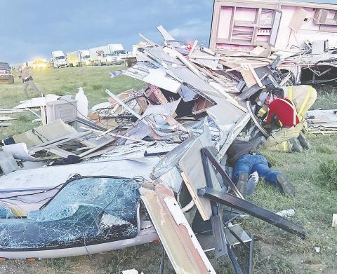Martin County first responders search for victims following a major three vehicle wreck in Martin County on I-20 Tuesday evening. See story this page.