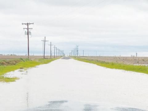 Some Martin County residents needed a boat to cross roads from the four plus inches of rain